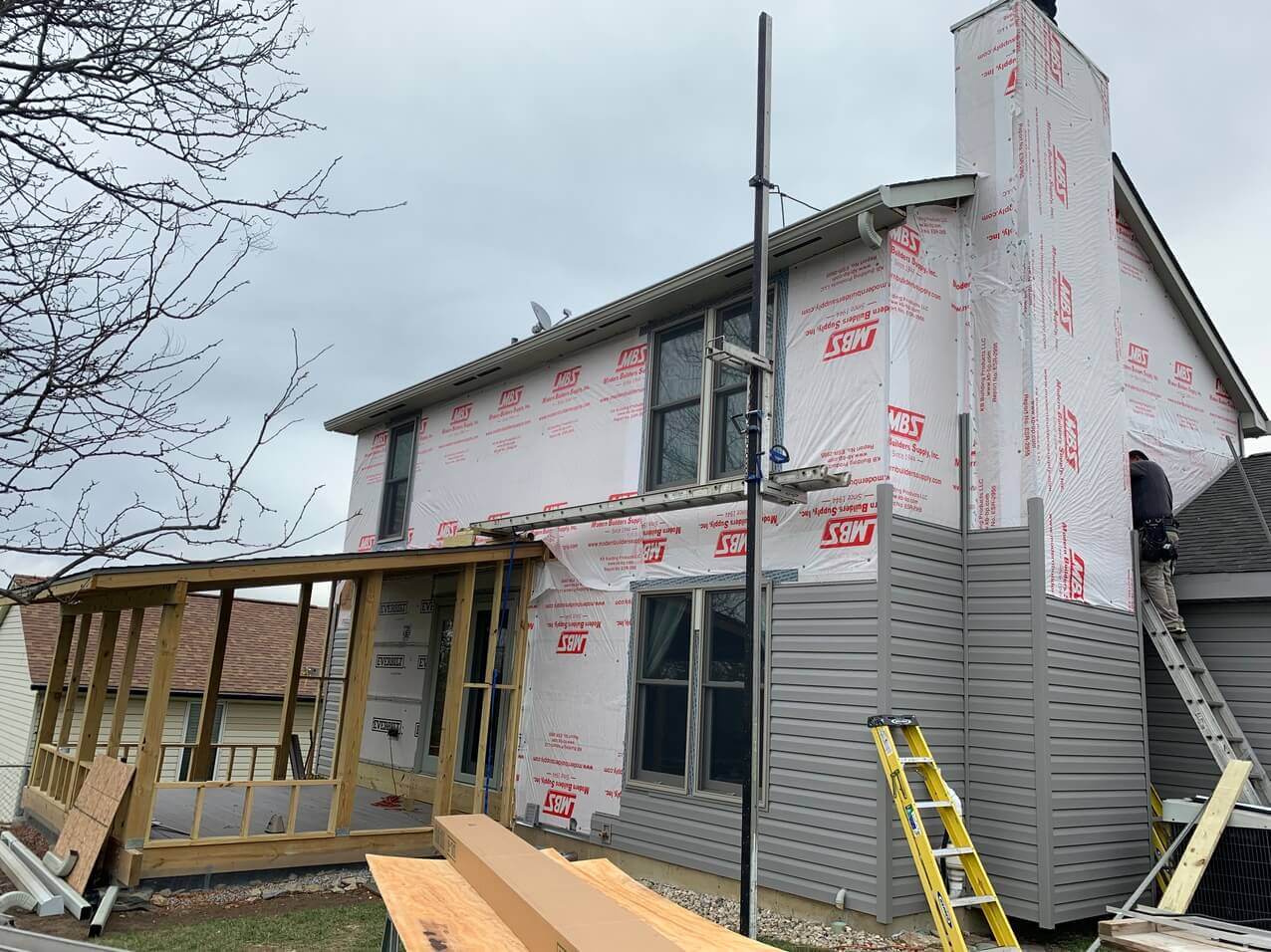 exterior of a residential home being re-sided